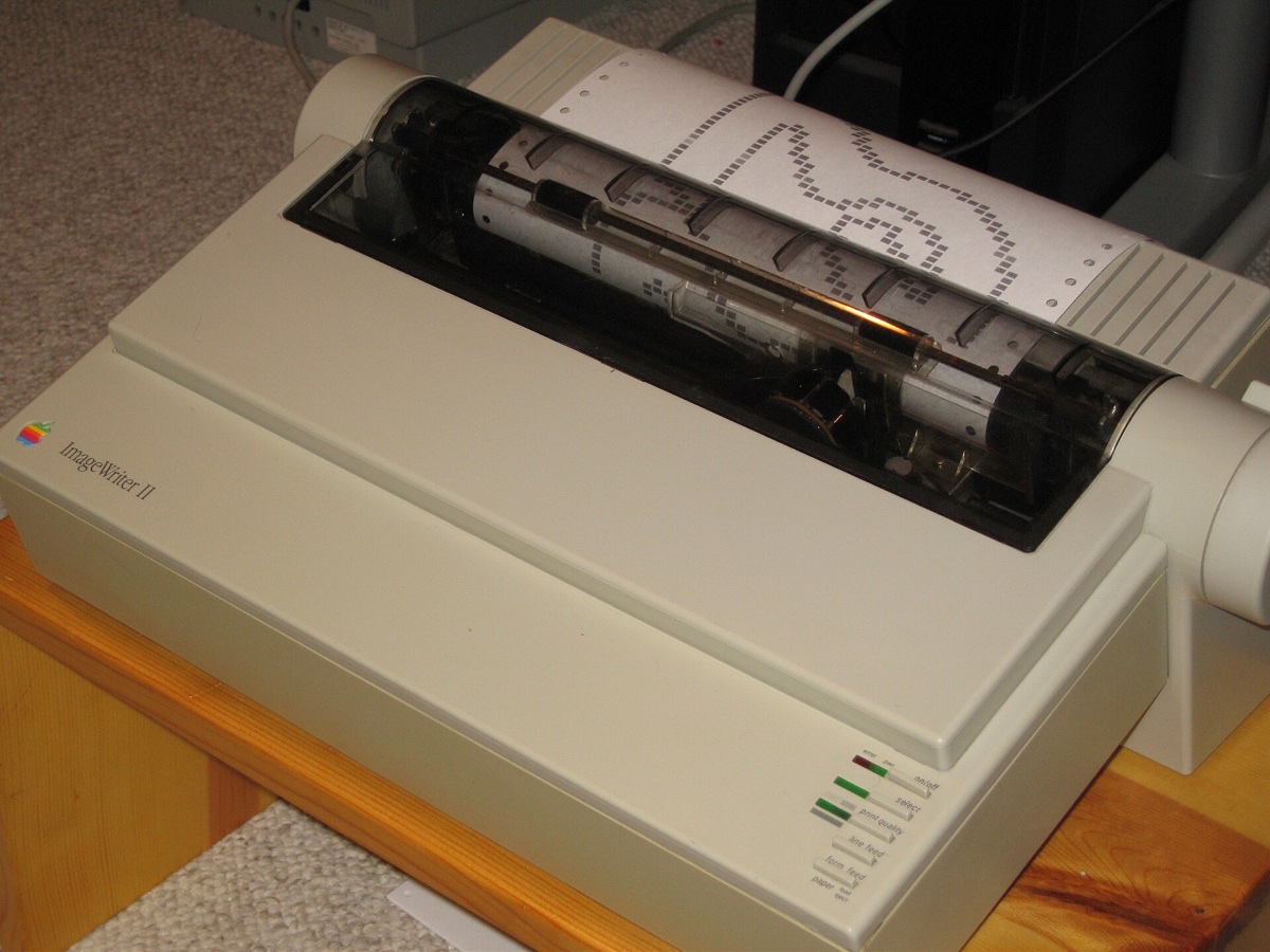 An Apple ImageWriter II dot matrix printer.